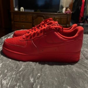 Brand New. Never Worn. Red Air Force 1’s. Men’s size 12.